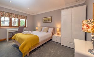 Hamble House - Bedroom 5: A double bed and use of a bathroom that's shared with Bedroom 4
