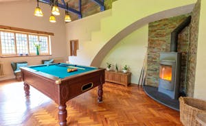 The Benches - The main hall, with fabulous architecture, parquet flooring, a pool table and a wood burning stove
