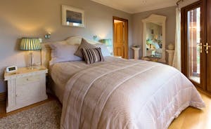 Hamble House - Bedroom 2 has a double bed, an en suite shower room, and its own balcony