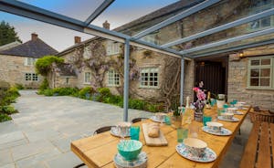 Frog Street: The patio and covered dining area at the front of the house