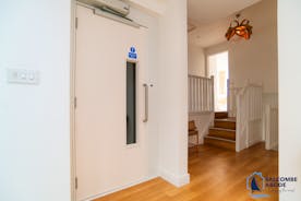 A lift providing wheelchair friendly access to all floor apart from the dining room 
