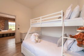 Inwood Farmhouse - Bedroom 1 (Stone Close): The adjoining bedroom has bunk beds - double on the bottom, single on top