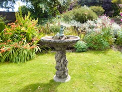  birdbath in the garden at Forest House, an 11 bed whole house holiday let in Coleford  - www.bhhl.co.uk