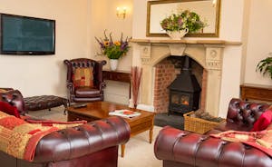 The Old Rectory - Relax in the sitting room / snug with a wood burning stove for those chillier days