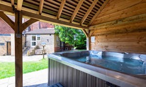 Relaxing days in the Hot Tub at Fairlea Grange large self catering accommodation sleeping 24 people Monmouthshire www.bhhl.co.uk