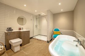 Boogie Barn: Bedroom 13 has an ensuite bathroom with a freestanding bath and separate shower