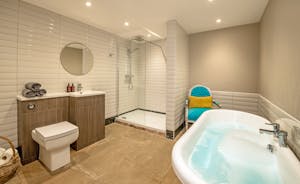 Boogie Barn: Bedroom 13 has an ensuite bathroom with a freestanding bath and separate shower