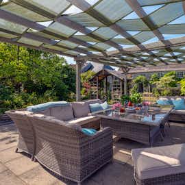 The sun shade on the pergola give the perfect retreat from the heat of the sun The sun shade on the pergola give the perfect retreat from the heat of the sun