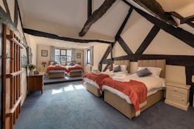 Luntley Court: Bedroom 1 makes a brilliant room for a family, with snooze space for 4