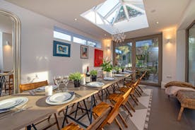 Tides Reach - The light-filled garden/dining room, with room for 15