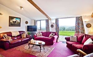 Comfy lounge with doors to outside space  High Cloud Farm Family and friends self catering accommodation accommodation Monmouthshire www.bhhl.co.uk
