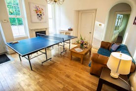 Sandfield House - The spacious hallway has ping-pong - and room for spectators
