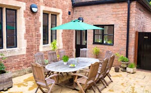 The Old Rectory - Dine outside on the private courtyard patio