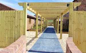 Quantock Barns - From the car park walk beneath a wooden pergola leads to your accommodation