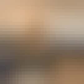 The TV is projected onto the wall above the fireplace, providing a clear view from every corner of the room. The TV is projected onto the wall above the fireplace, providing a clear view from every corner of the room.