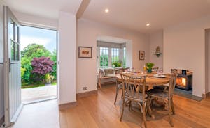 Perys Hill - The Cottage: Step into the dining room, with a double sided wood-burner for when it's cold out