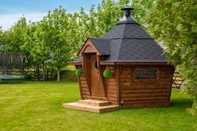 Herons Bank - In the garden there's a cosy Scandi style BBQ lodge for year round use
