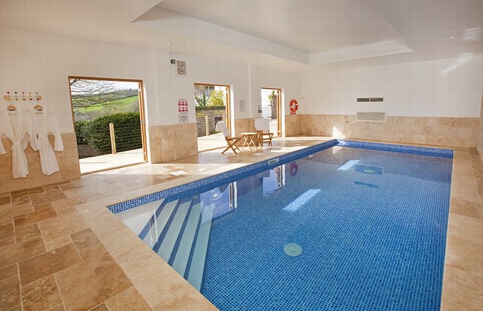 Large Devon house sleeping 16 in 8 bedrooms with indoor pool, games room and stunning views
