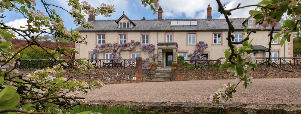 Hurstone in spring, with blossom and wisteria 