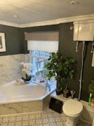 Family Bathroom Sunken bath with great views