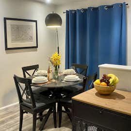 Open plan living space: enjoy your meals at the round dining table  Open plan living space: enjoy your meals at the round dining table