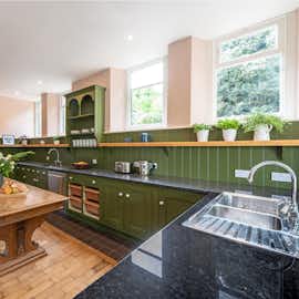 Kennard Hall -  The kitchen is country style (NB: Aga no longer in use - there are 2 electric ovens) Kennard Hall -  The kitchen is country style (NB: Aga no longer in use - there are 2 electric ovens)