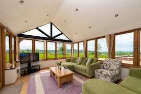 Wayside: The sun room is used as a second living room and has amazing views across the Culm Valley