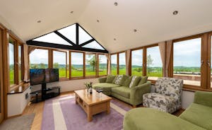 Wayside: The sun room is used as a second living room and has amazing views across the Culm Valley
