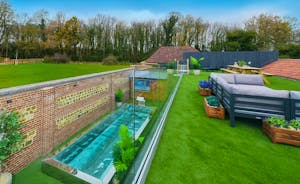 Zippity - The outdoor space is amazing; downstairs a heated pool and outdoor cinema, upstairs a roof terrace