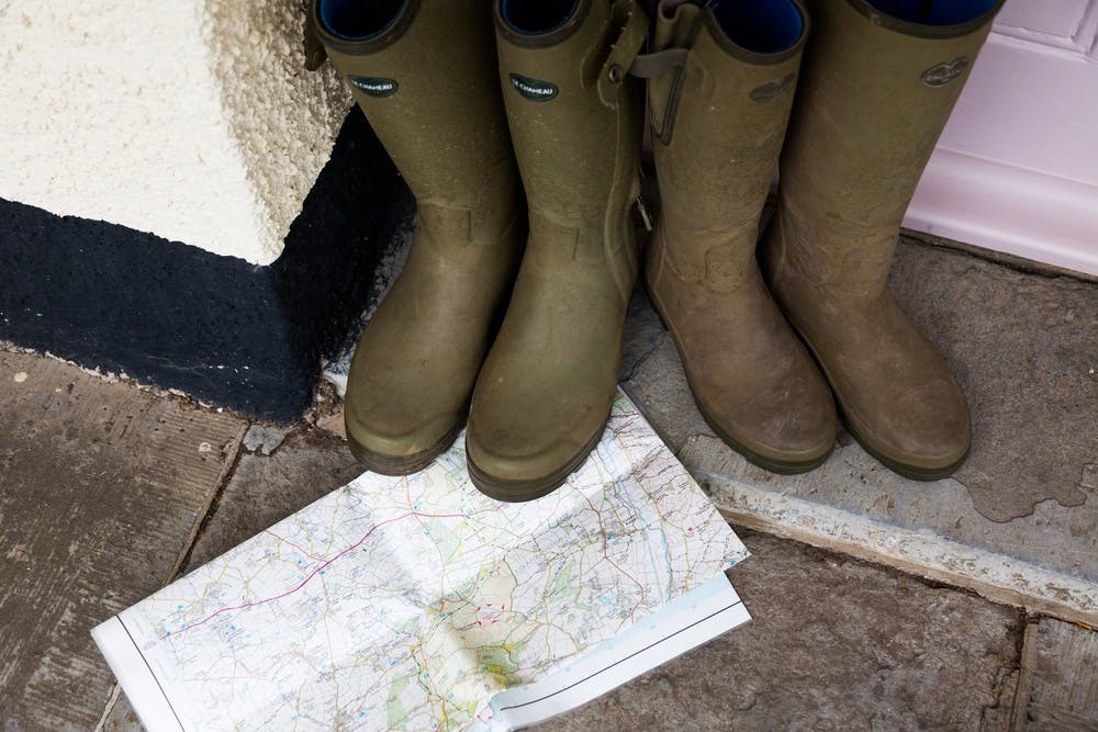 Wellington boots and ordnance survey map