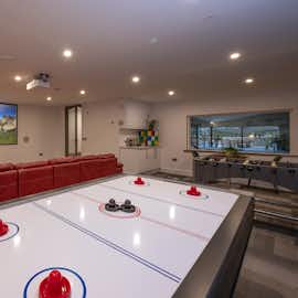Cricklehaze - The games room/movie room has table football and an air hockey/pool/table tennis table Cricklehaze - The games room/movie room has table football and an air hockey/pool/table tennis table