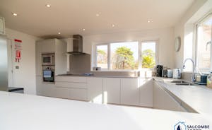 A well equipped and modern kitchen with stunning views 