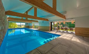 The 15m indoor swimming pool, heated to 29 degrees, with far reaching views