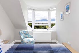 Double Bedroom - on the first floor this double room may be cottage sized, but with breath taking views to Arran and beyond as you relax in bed, it really is quite special. 