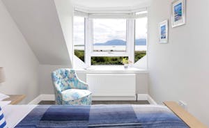 Double Bedroom - on the first floor this double room may be cottage sized, but with breath taking views to Arran and beyond as you relax in bed, it really is quite special. 