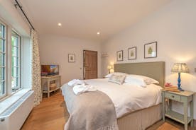 Perys Hill - The Cottage: Bedroom 1 is a ground floor room with a super king bed