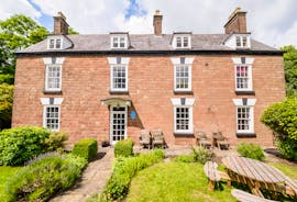 The front elevation of Forest House, an elegant 11 bed holiday let in Coleford - www.bhhl.co.uk