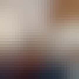 Plenty of space for 24 guests to chill in the lounge with its huge arch window and oversized stone fireplace and wood burner  The Manor on the Monnow Monmouth www.bhhl.co.uk Plenty of space for 24 guests to chill in the lounge with its huge arch window and oversized stone fireplace and wood burner  The Manor on the Monnow Monmouth www.bhhl.co.uk