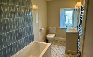 Family Bathroom with bath over shower and large sink