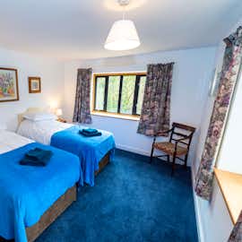 Bedroom 4, Twin, shares family bath and shower with Bedroom 3 Manor on the Monnow 11 bedroom holiday accommodation Monmouth Monmouthshire www.bhhl.co.uk  Bedroom 4, Twin, shares family bath and shower with Bedroom 3 Manor on the Monnow 11 bedroom holiday accommodation Monmouth Monmouthshire www.bhhl.co.uk