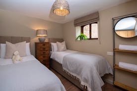 Whimbrels Barton - Bedroom 5 is a ground floor room in  Bean Goose Barn with zip and link beds