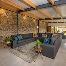 Hares Barton - The lounge area in the open plan living space Hares Barton - The lounge area in the open plan living space