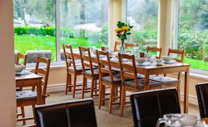 Large dining space with the spectacular River Wye backdrop Wye Rapids House    www.bhhl.co.uk