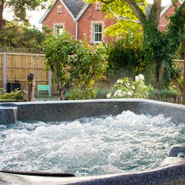Unwind in the hot tub Unwind in the hot tub
