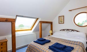 Feature windows in a double room High Cloud Farm and Barn self catering holiday accommodation  Welsh county side www.bhhl.co.uk