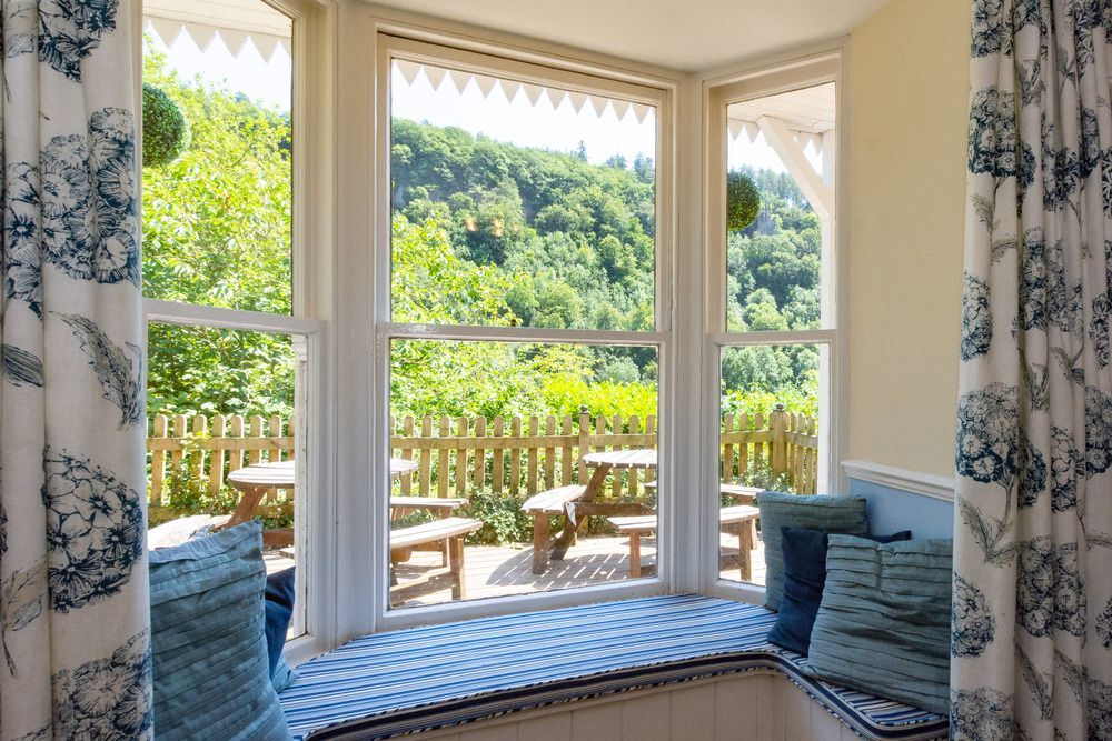 view through large window to the river wye