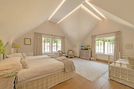 Perys Hill - The Farmhouse: Bedroom 3 makes a great family room, with room for 2 extra beds for children 