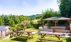 Relax with family and friends in the garden and Hot Tub - River Wye Lodge 10 bedroom self catering accommodation Nr. Forest of Dean www.bhhl.co.uk