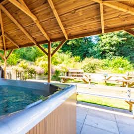 Relaxing times in the covered Hot Tub at River Wye Lodge large holiday accommodation Nr. Ross-on-Wye Wye Valley Herefordshire www.bhhl.co.uk Relaxing times in the covered Hot Tub at River Wye Lodge large holiday accommodation Nr. Ross-on-Wye Wye Valley Herefordshire www.bhhl.co.uk