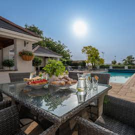 Sampford View - There's a large pool terrace with far reaching views across the Somerset countryside Sampford View - There's a large pool terrace with far reaching views across the Somerset countryside